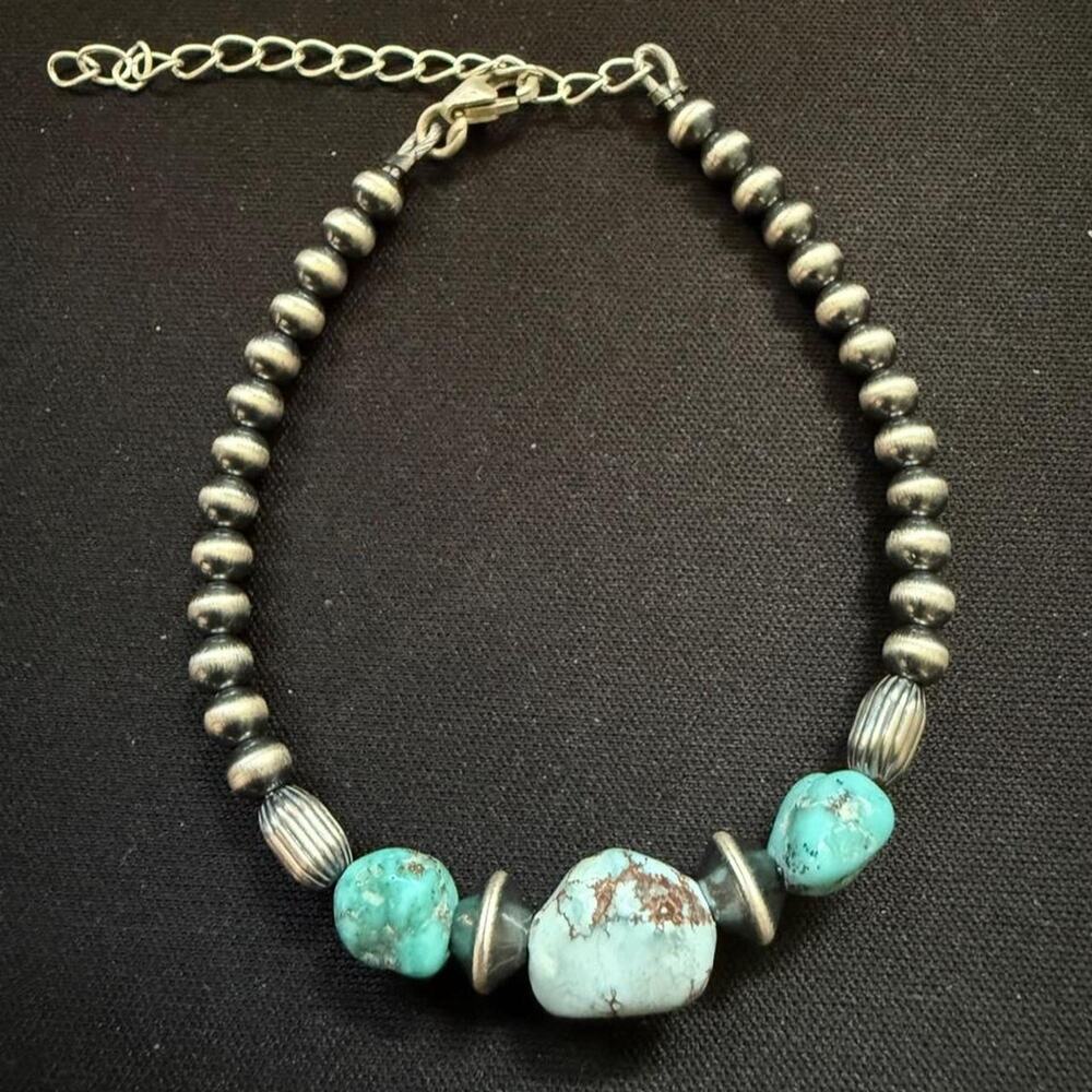 Native strung sterling silver pearls